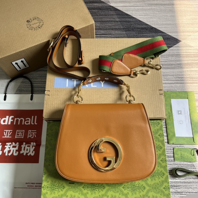 G*u*i top handle bags